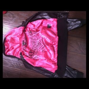 Pink and Black Metal Mulisha Leather jacket.